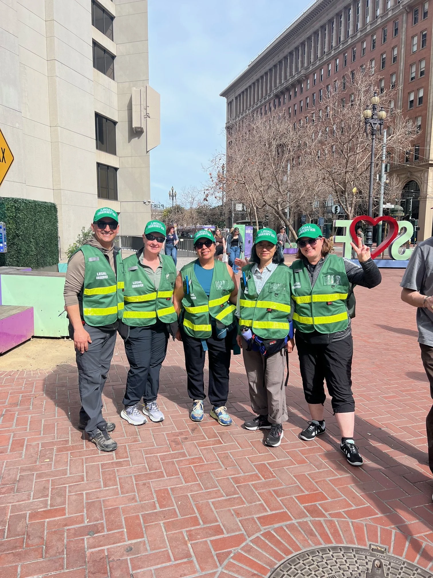 A group of observers at a San Francisco rally