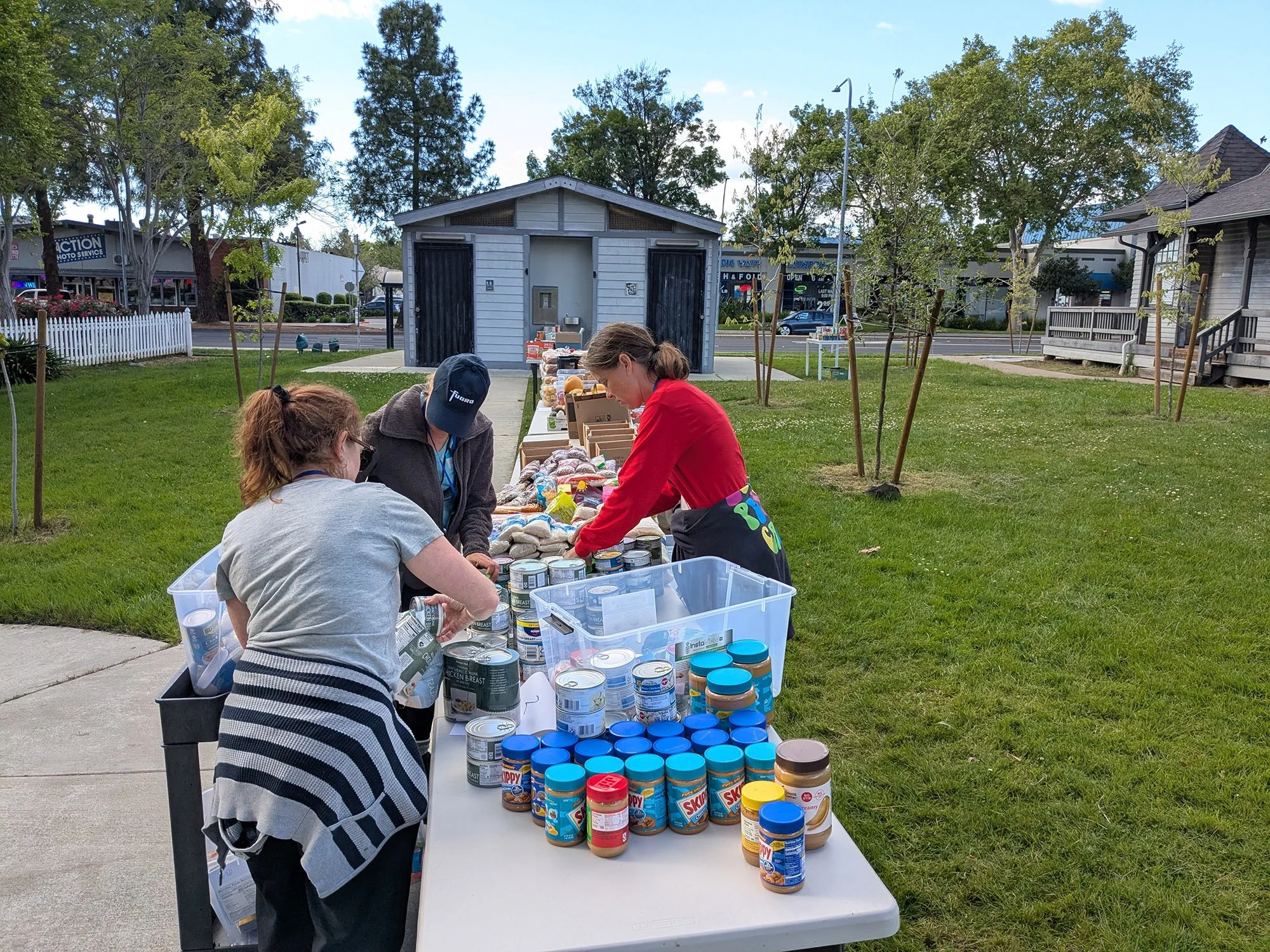 Volunteers prepare food donations at the Food Pantry