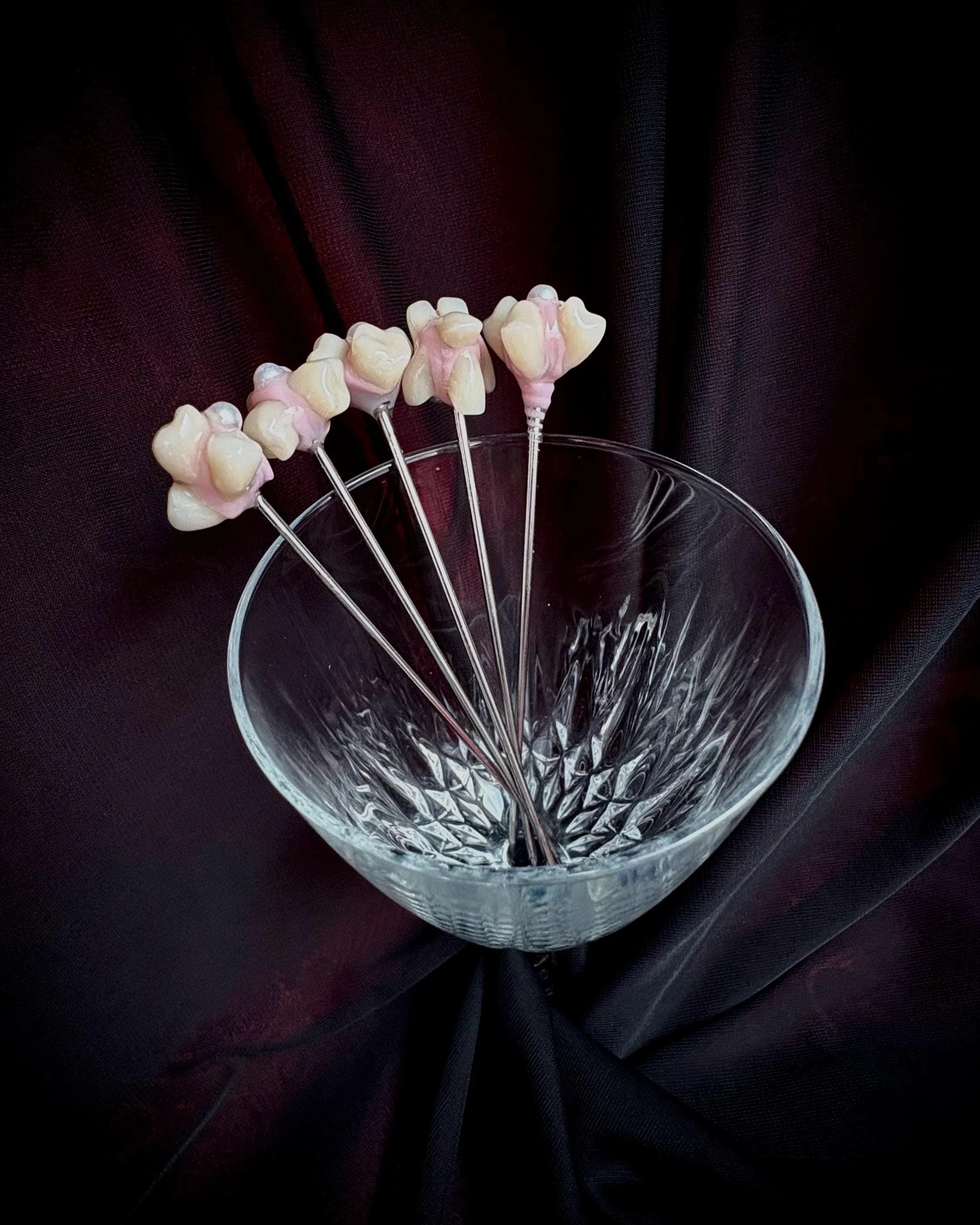 No More Candies cocktail picks used in drink – creepy cute barware aesthetic