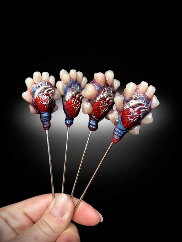 Dark Hearted anatomical heart cocktail picks set of 5 displayed in glass gothic barware