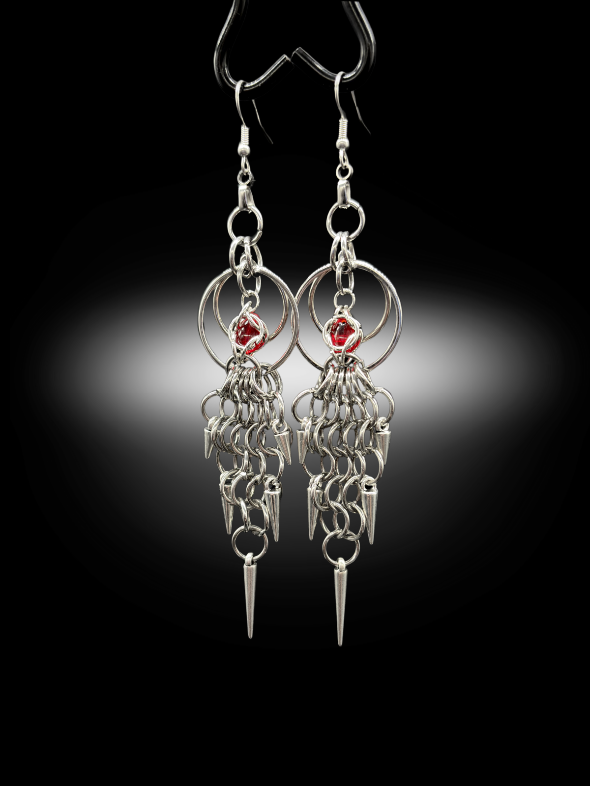handmade chainmail earrings with dangling spikes and metal rings alternative fashion accessory