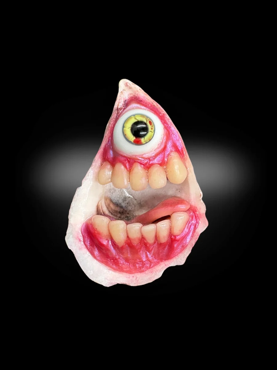 gothic oddity art piece made from real oyster shell with monster face