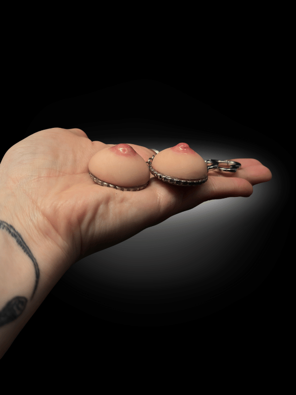 ALT: surreal novelty keychain attached to bag for scale and everyday use