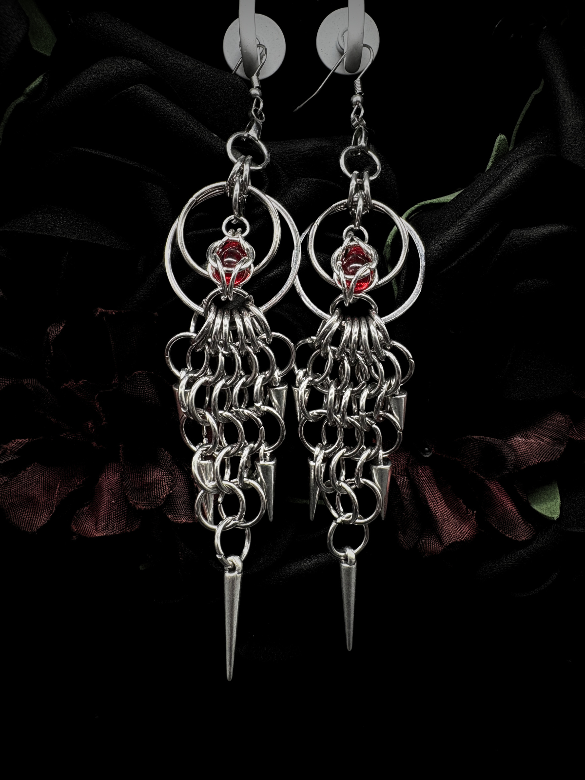 spiked chainmail earrings worn showing movement and scale