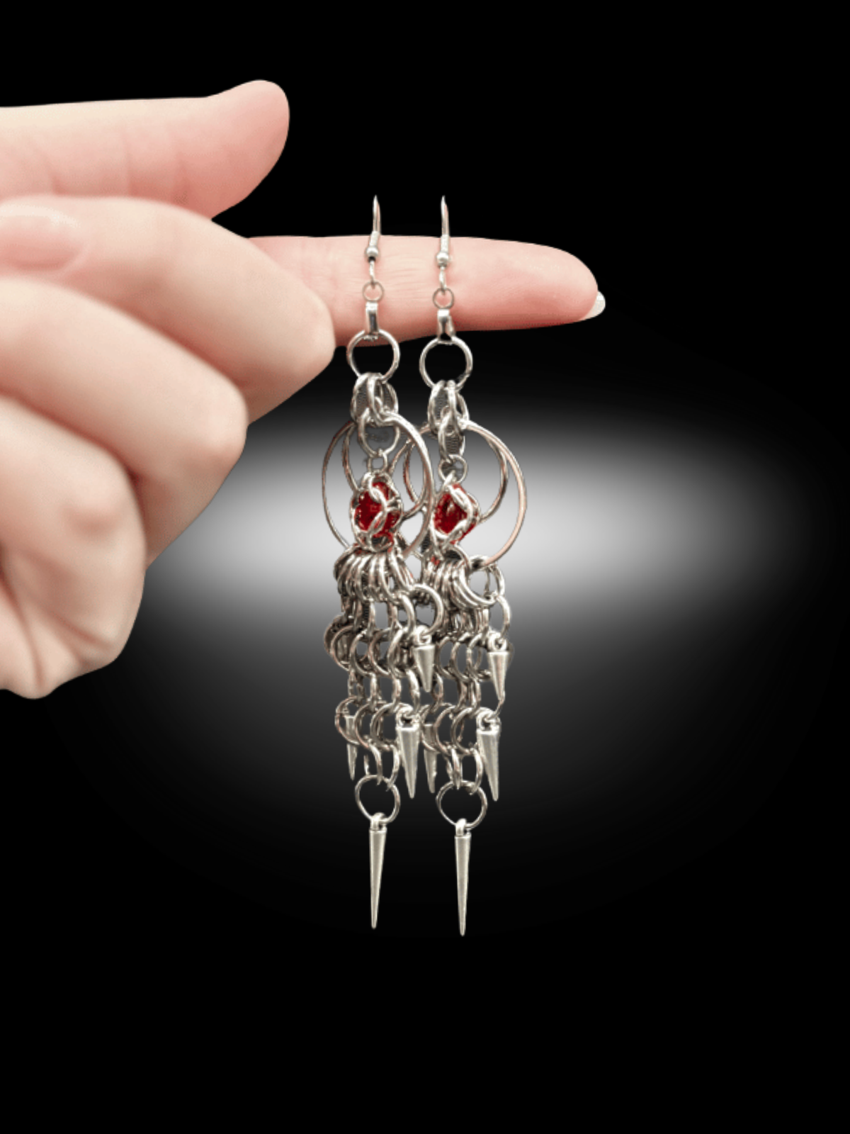 spiked chainmail earrings worn showing movement and scale