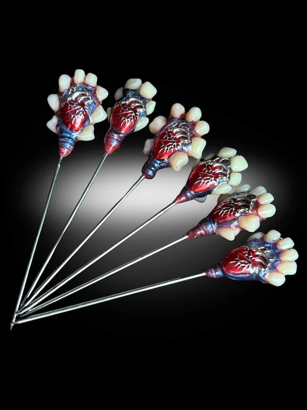 Dark Hearted anatomical heart cocktail picks set of 5 displayed in glass gothic barware