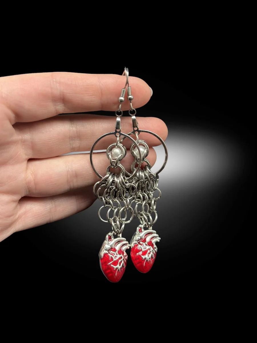 Heavy Heart earrings showing layered chainmail texture and movement