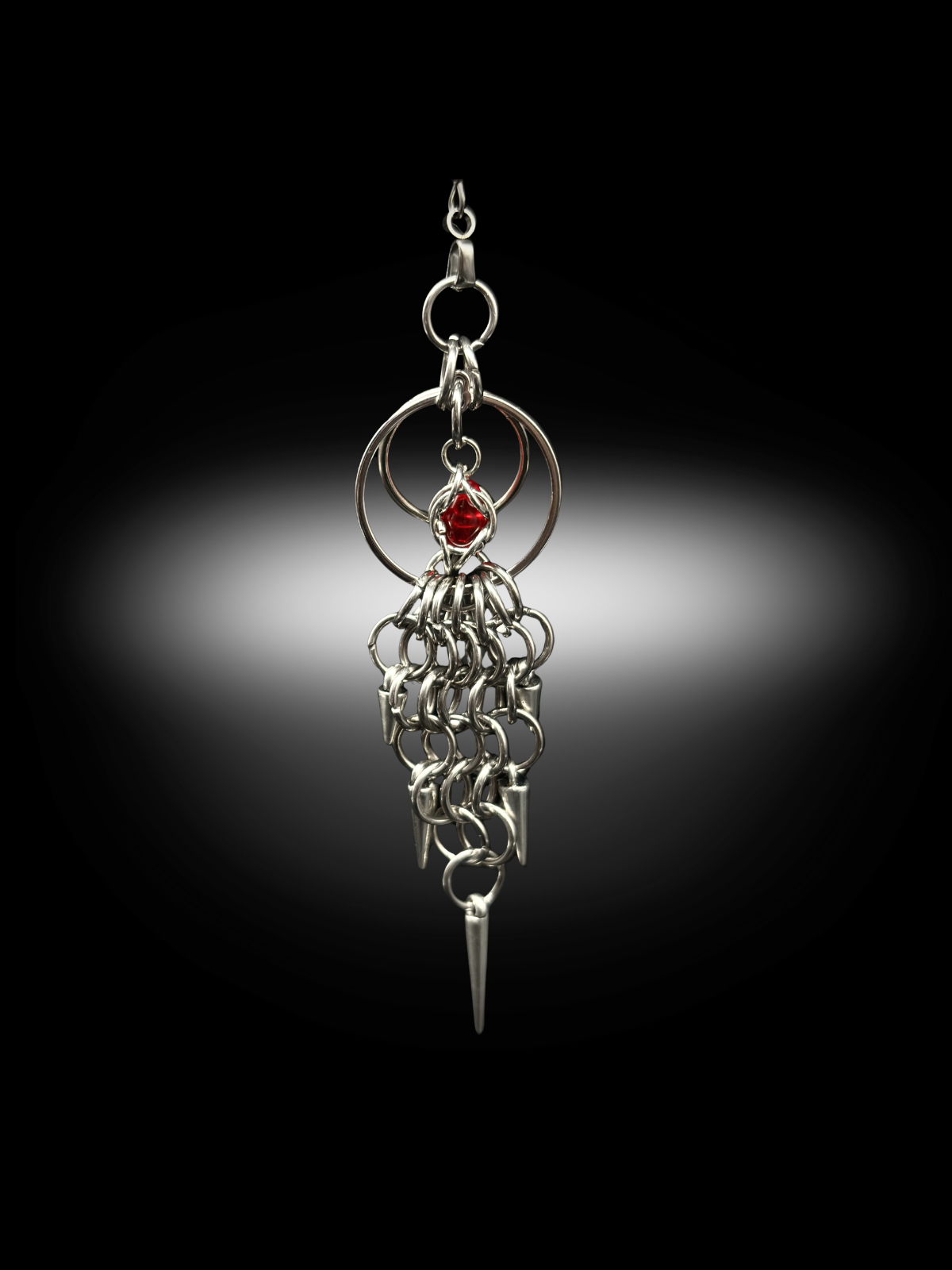 gothic statement earrings with chainmail weave and spike charms