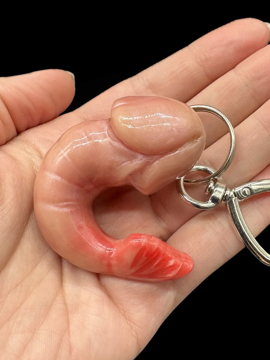 close up of handmade shrimp keychain showing realistic texture and color