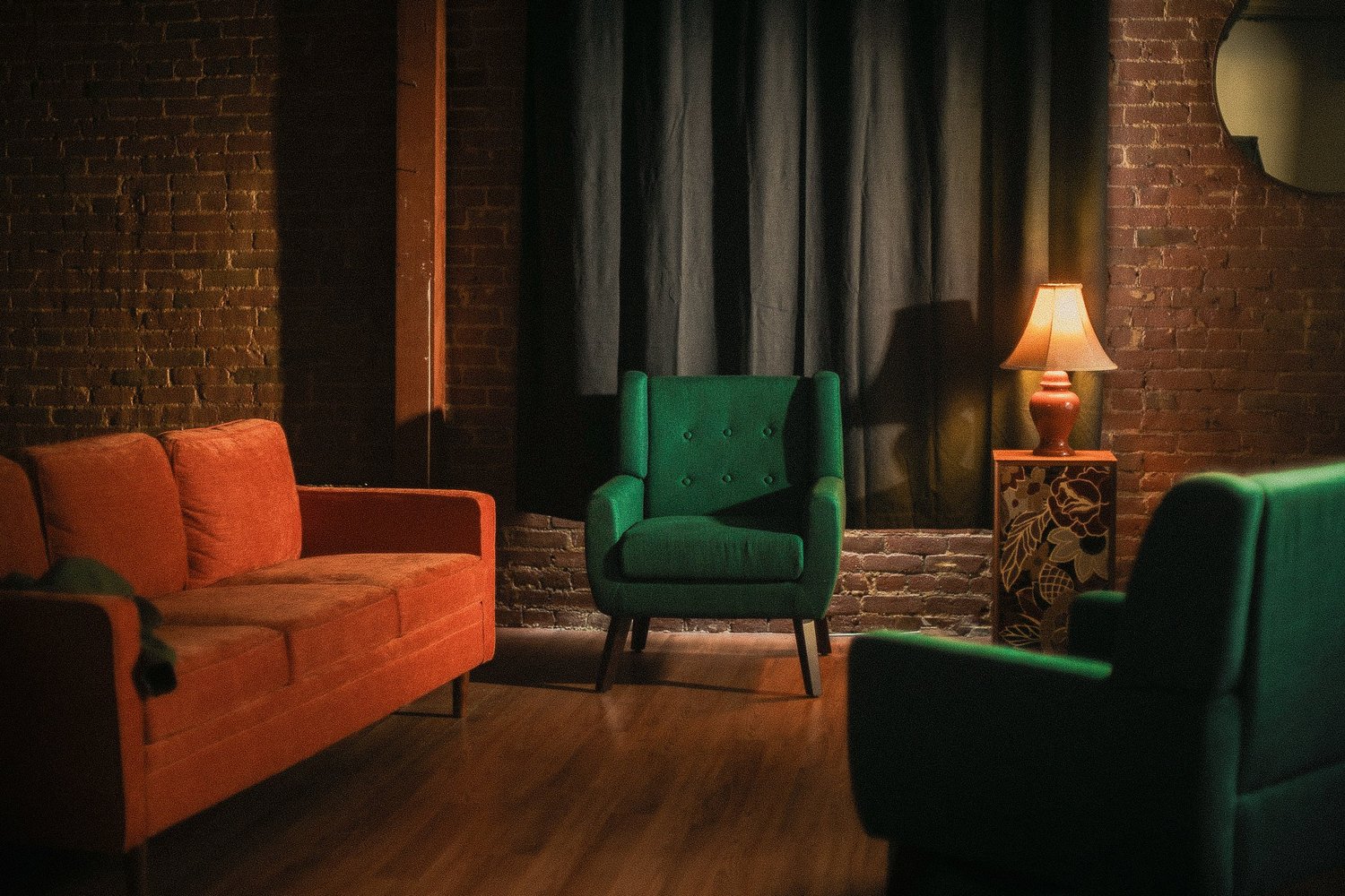 Closer view of lounge furniture and textured brick