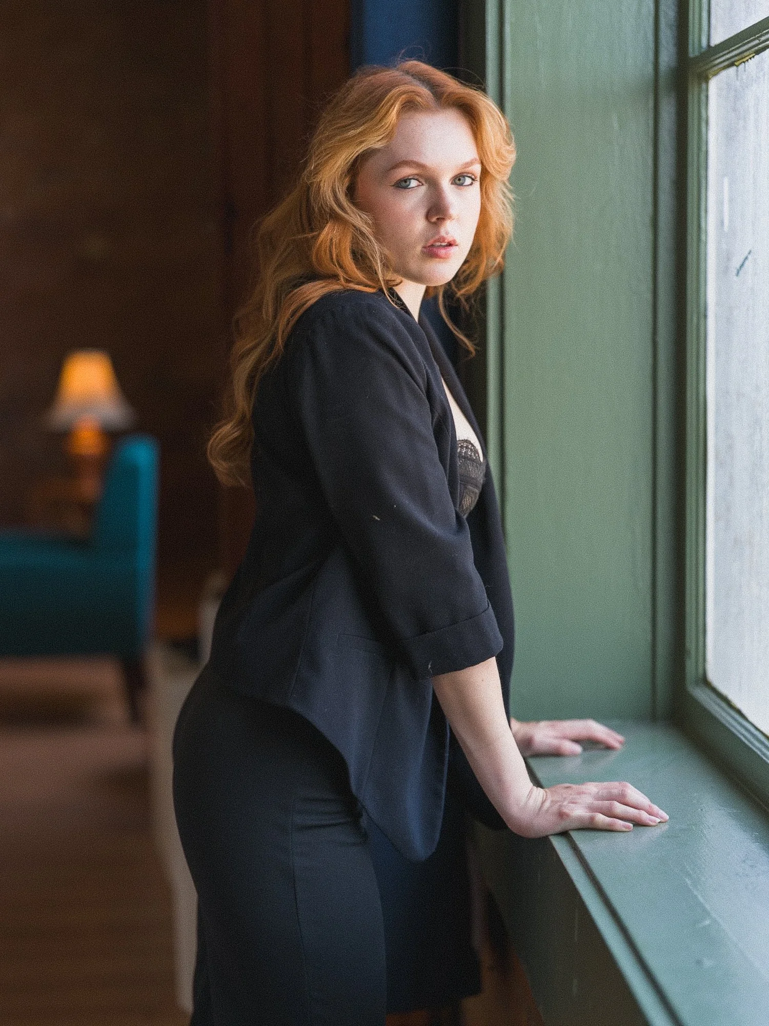 Portrait by the studio window