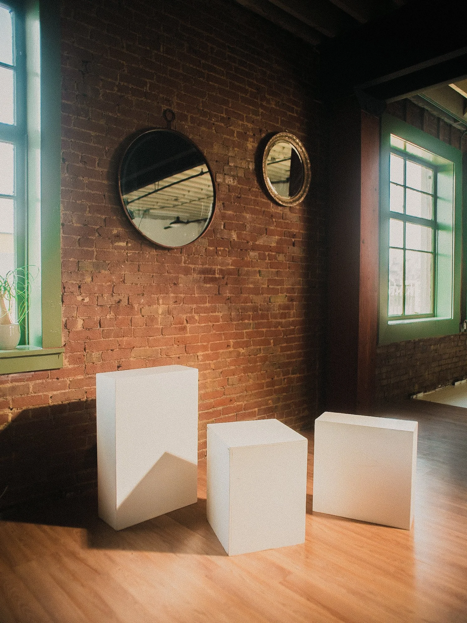 Brick wall with mirrors and posing blocks