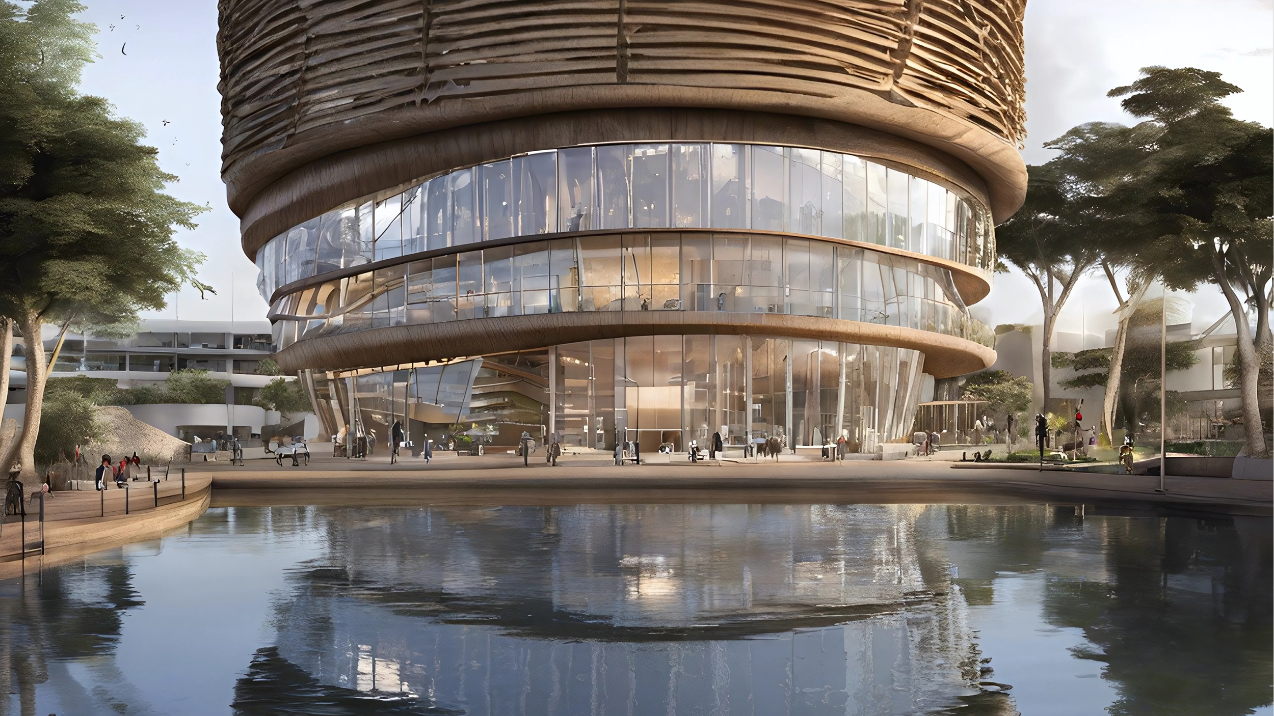 A modern architectural building with a curved design, glass windows, and wooden textured exterior, situated near a reflecting pool with a walkway surrounding it.