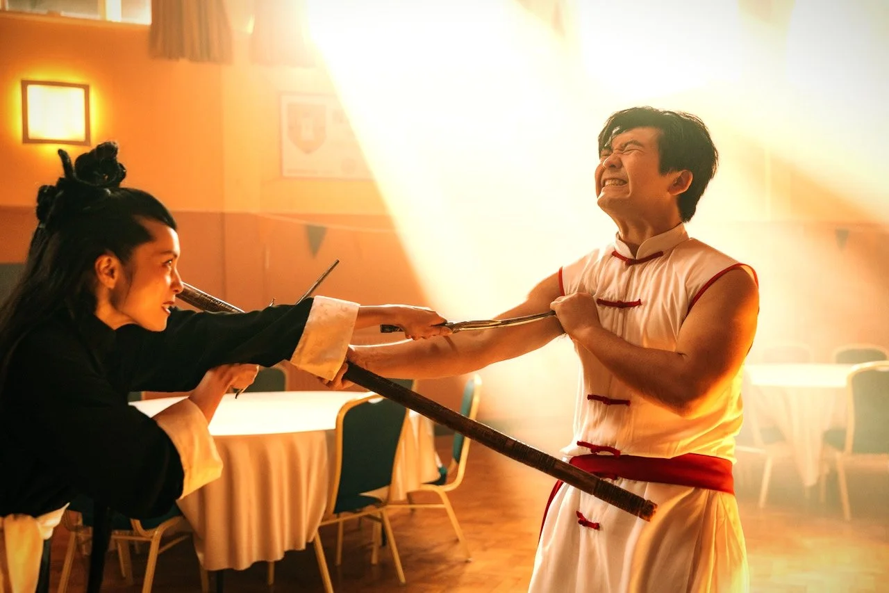 Comic martial arts fight scene with a man and a woman