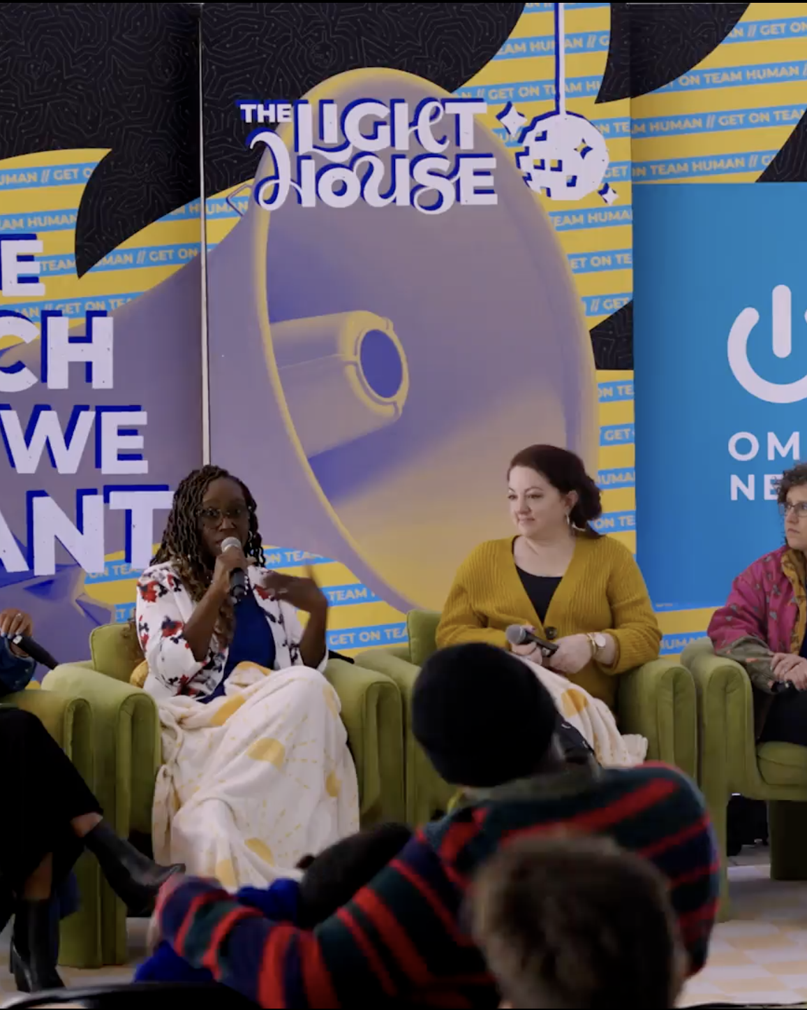 Panel of speakers in discussion at a SXSW event in Austin.