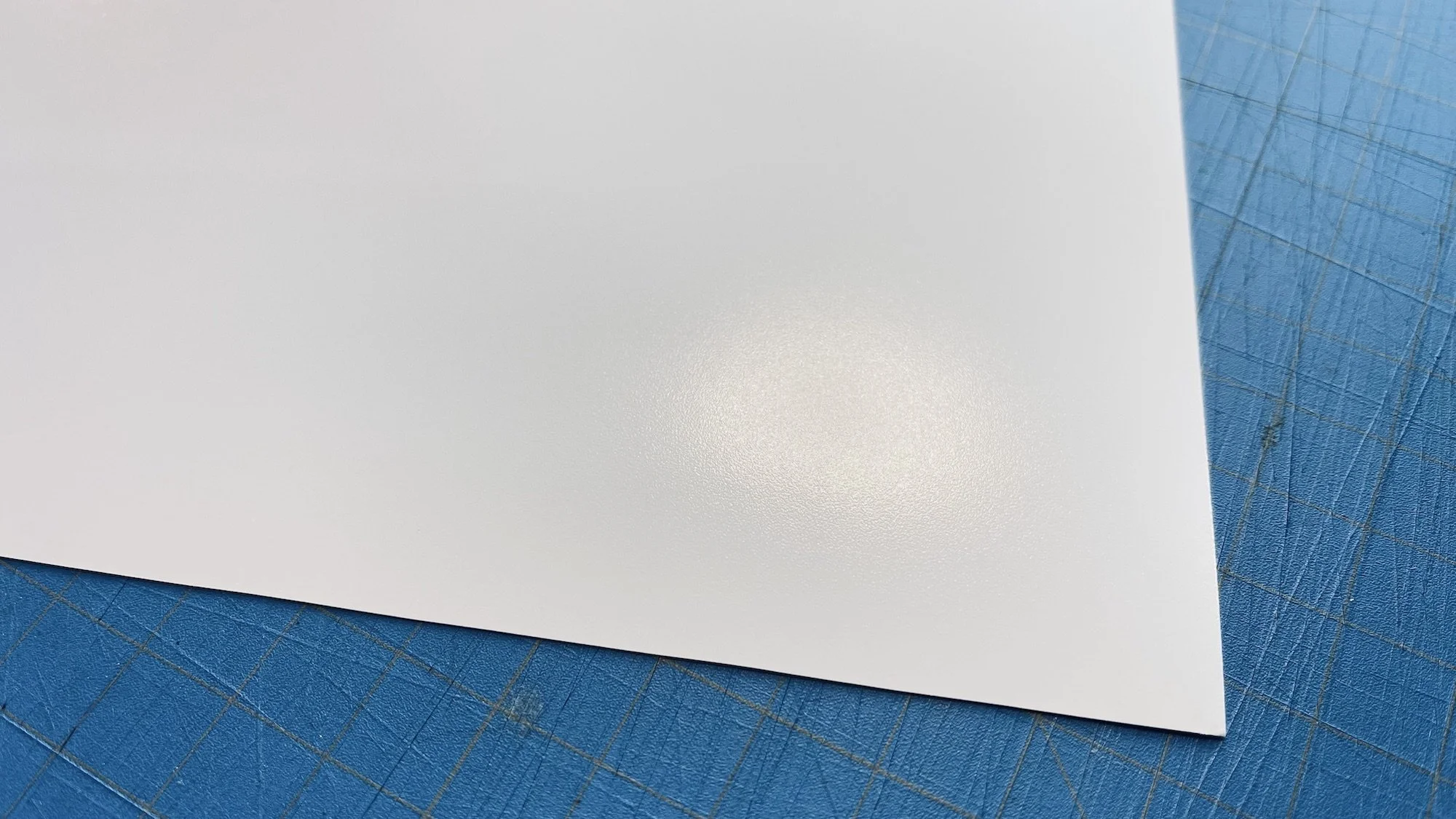 Close-up photo depicting the rich sheen of  our premium luster paper. 260 gsm -265 gsm