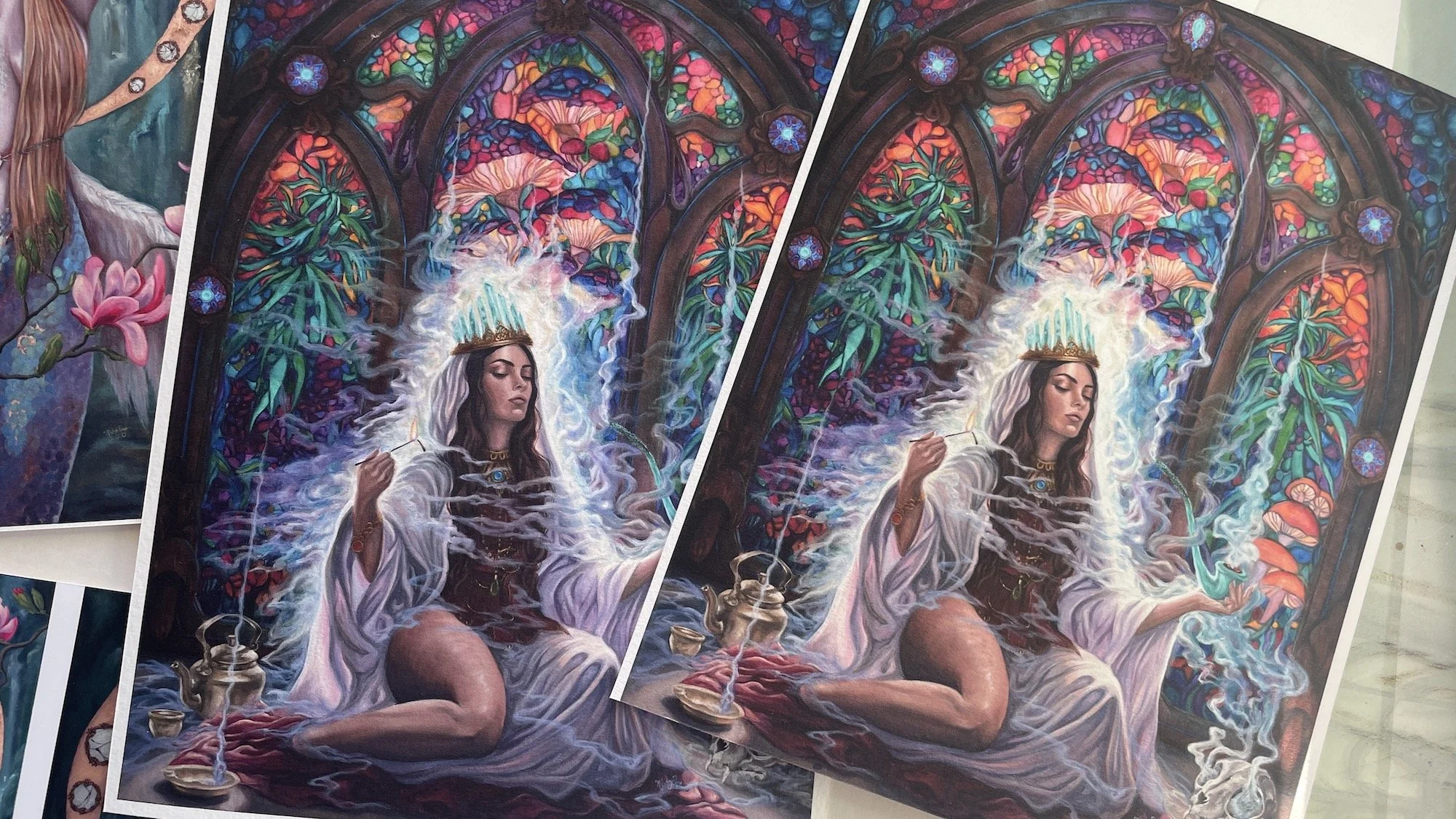 Archival pigment prints of figurative artwork on textured cotton rag paper.