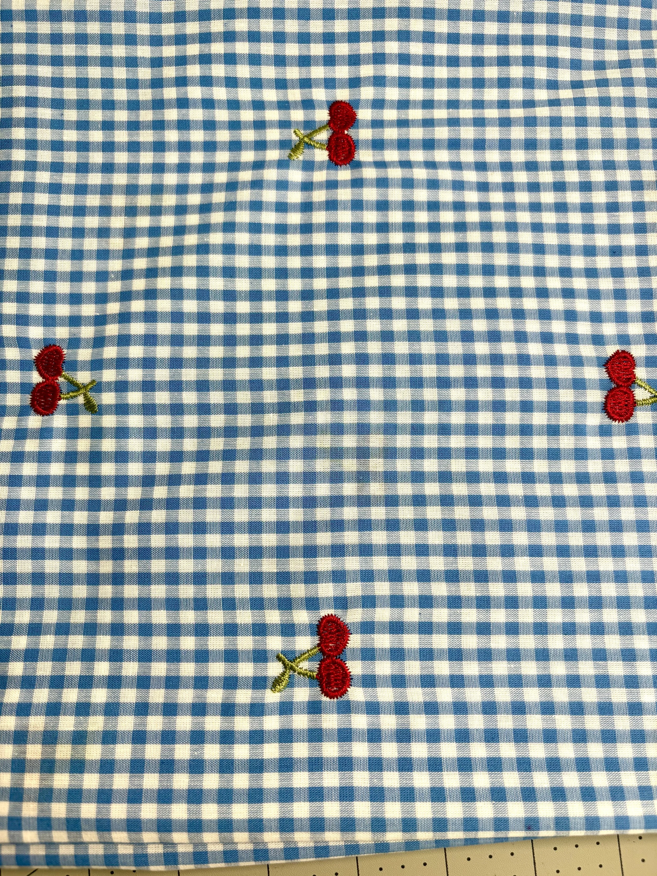 Cherries on blue gingham