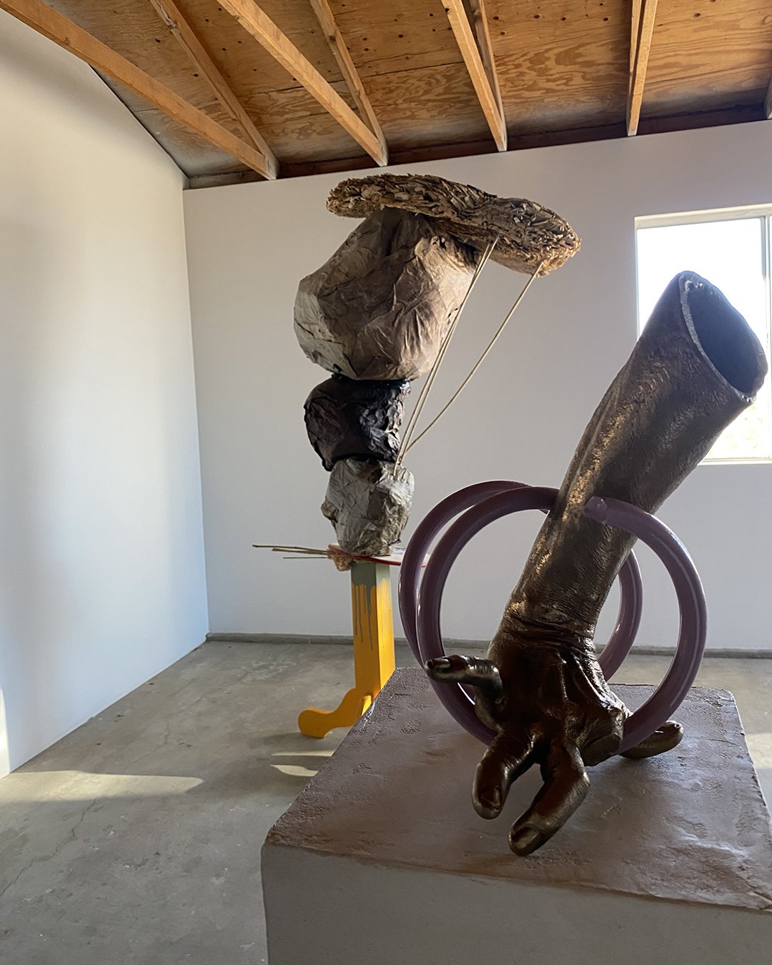 Heidi Schwegler's sculpture is in the front, and Coleen Sterritt's sculpture is in the back.