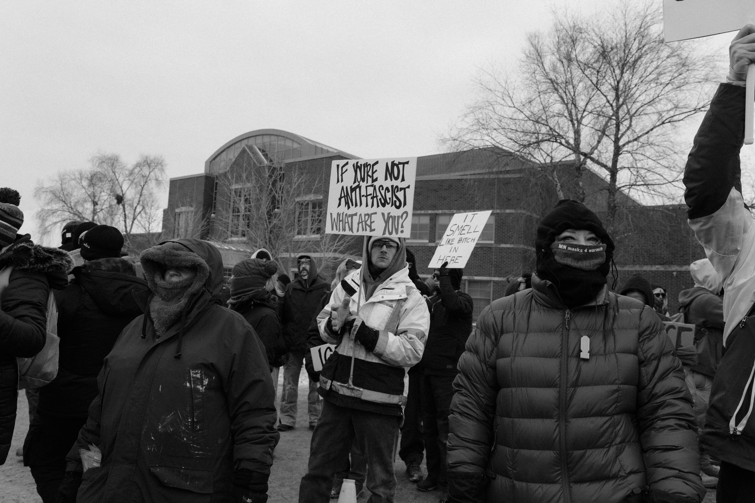 January 17 2026 outside the Whipple Federal Building in Minneapolis. ICE agents entered and exited the federal facility as community members gathered nearby to protest. Tensions escalated when federal agents threatened to use chemical irritants and, 