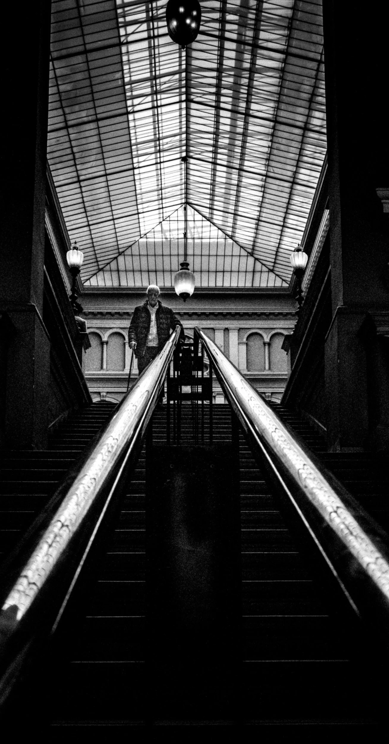 Descending the Post office, Ufficio Postale, grand staircase. Trieste, Italy.
