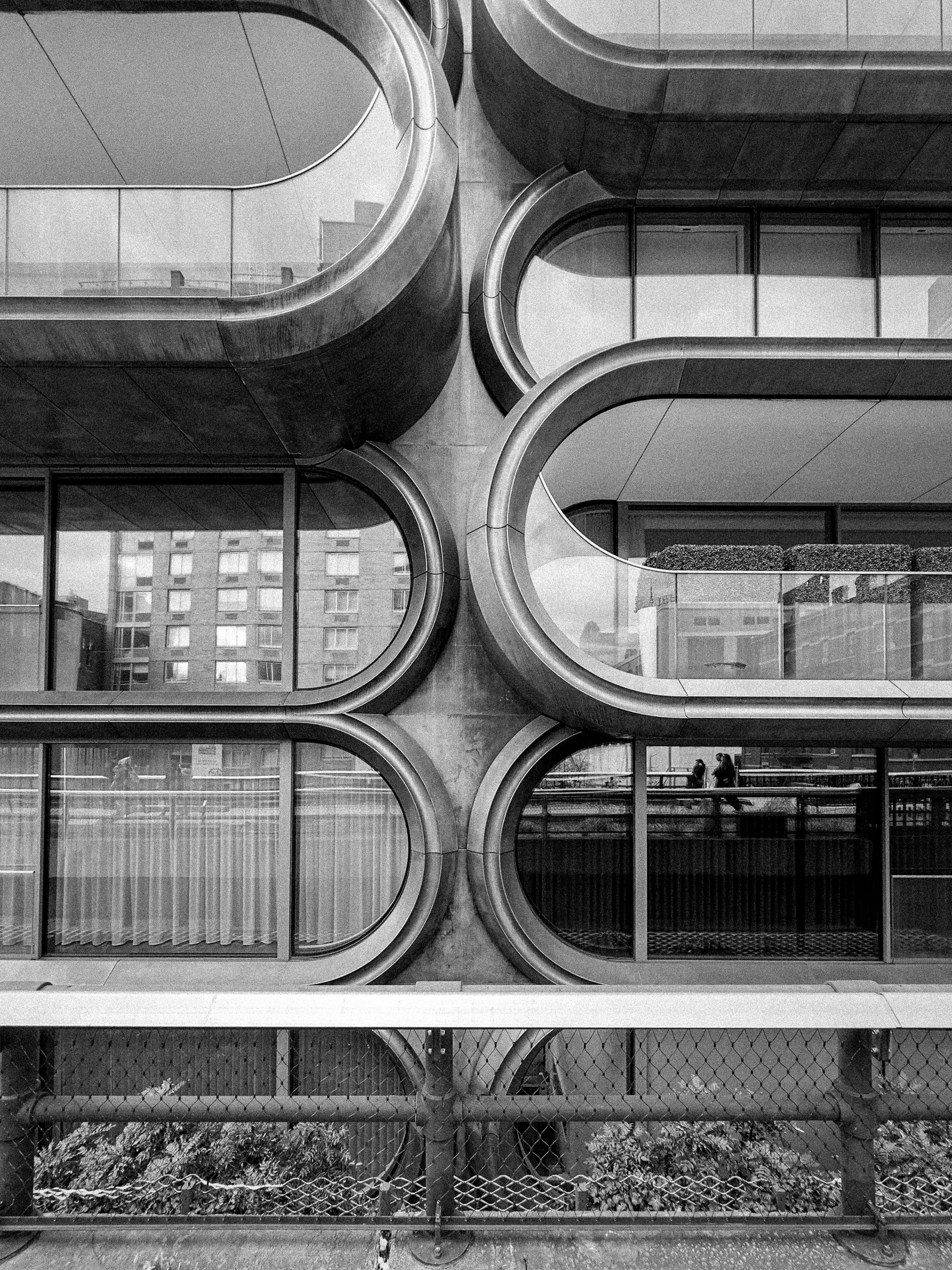 Apartment building by Zaha Hadid, 240 West 28th street New York City. Architectural detail viewed from The High Line. Black and white art photography.