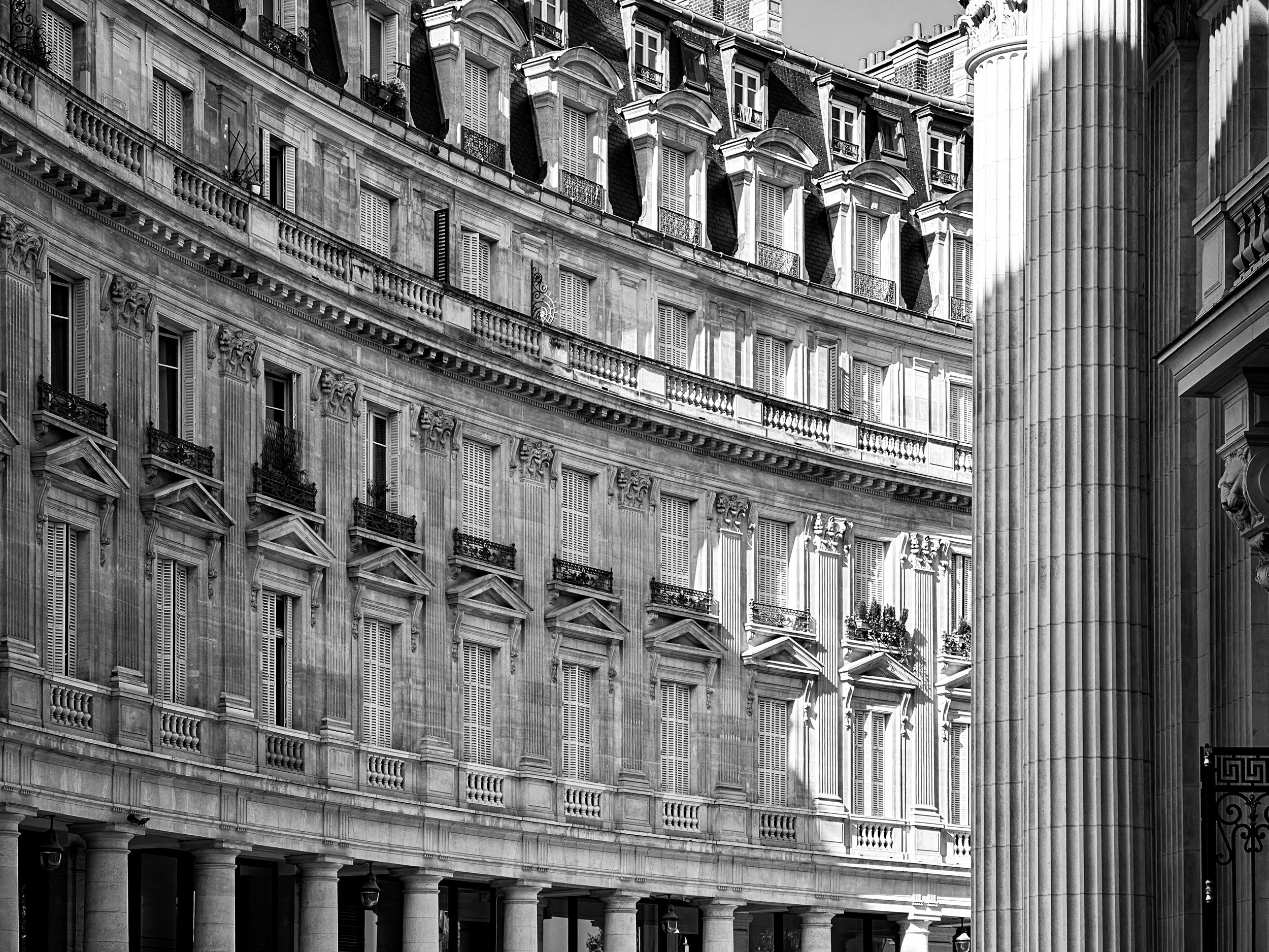 Neoclassical facade, Rue de Viarmes-f Paris France. Black and white art photography.