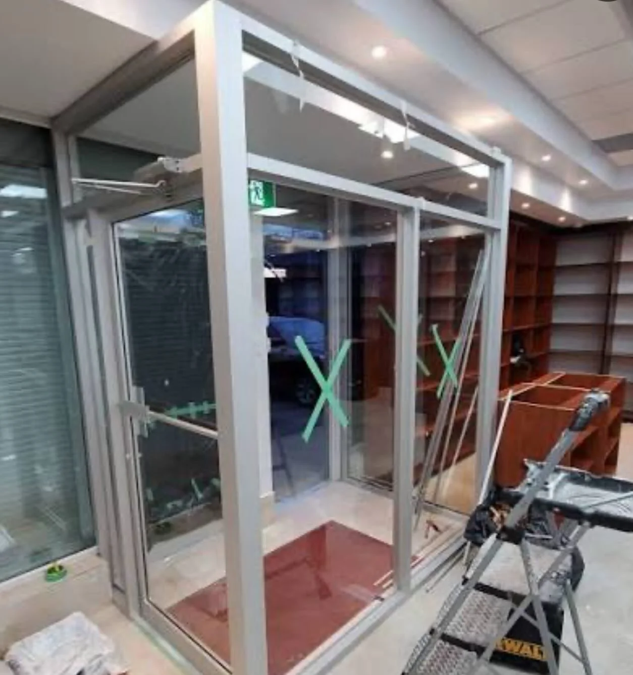 Fabricate and install commercial vestibule 
#vestibule #commercial #aluminum #door