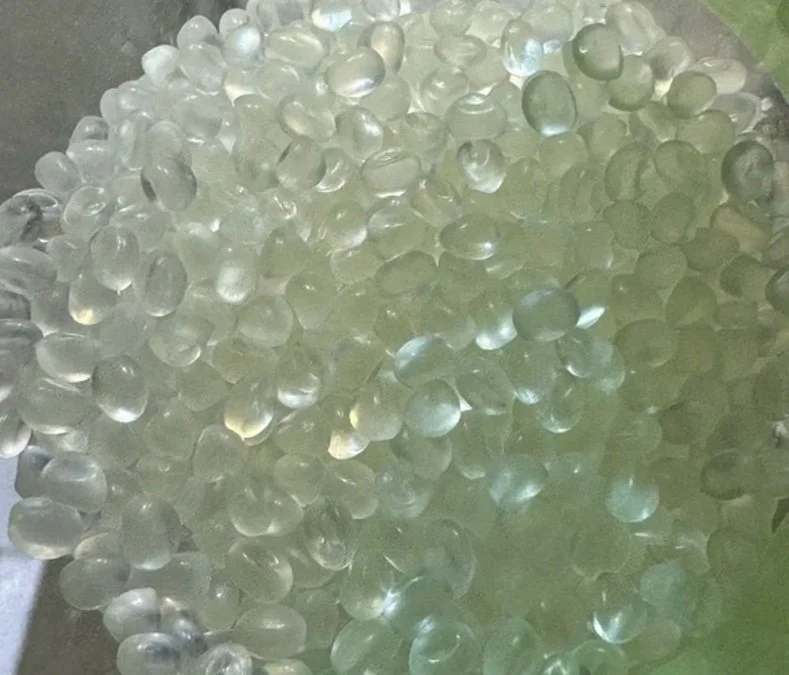 A pile of translucent glass fragrant beads