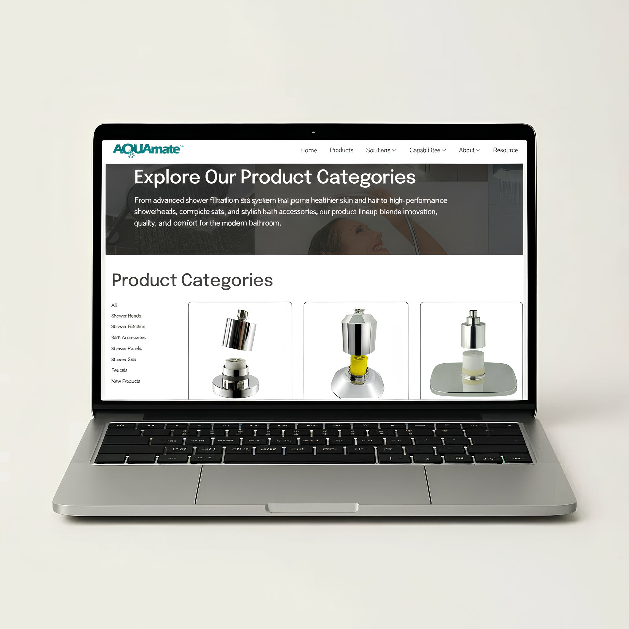 Laptop on a wooden desk displaying an online store for bathroom fixtures and accessories, with a white mug and a computer mouse nearby.