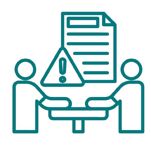 Two people sitting at a table discussing a document with an alert symbol and exclamation mark.