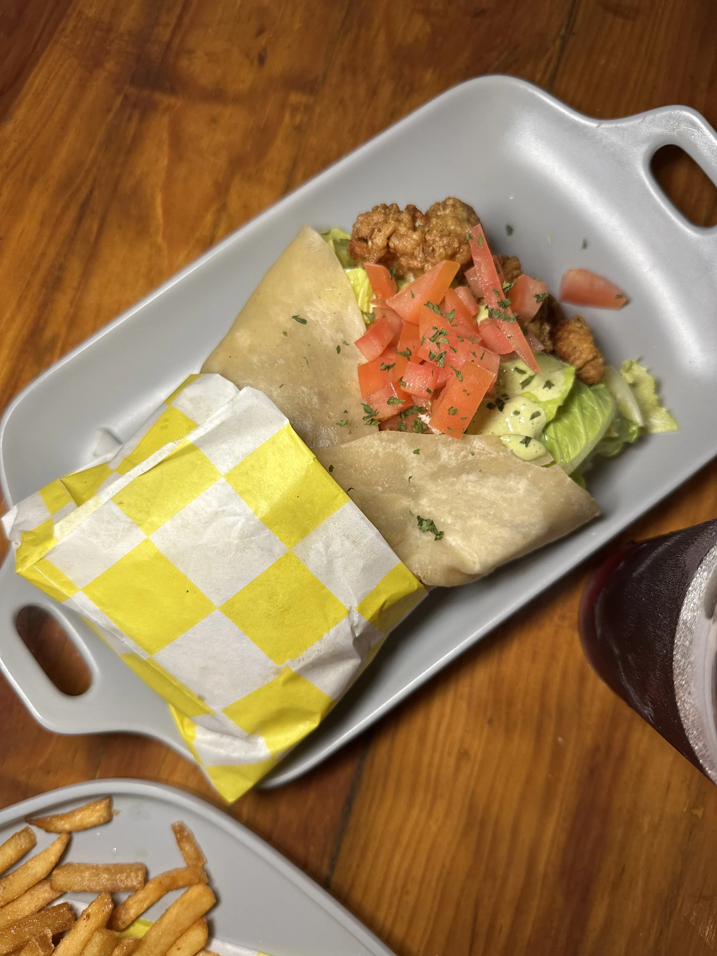 Algo Bueno chicken sandwich in zona romantica with a wrap and two agua frescas in puerto vallarta mexico