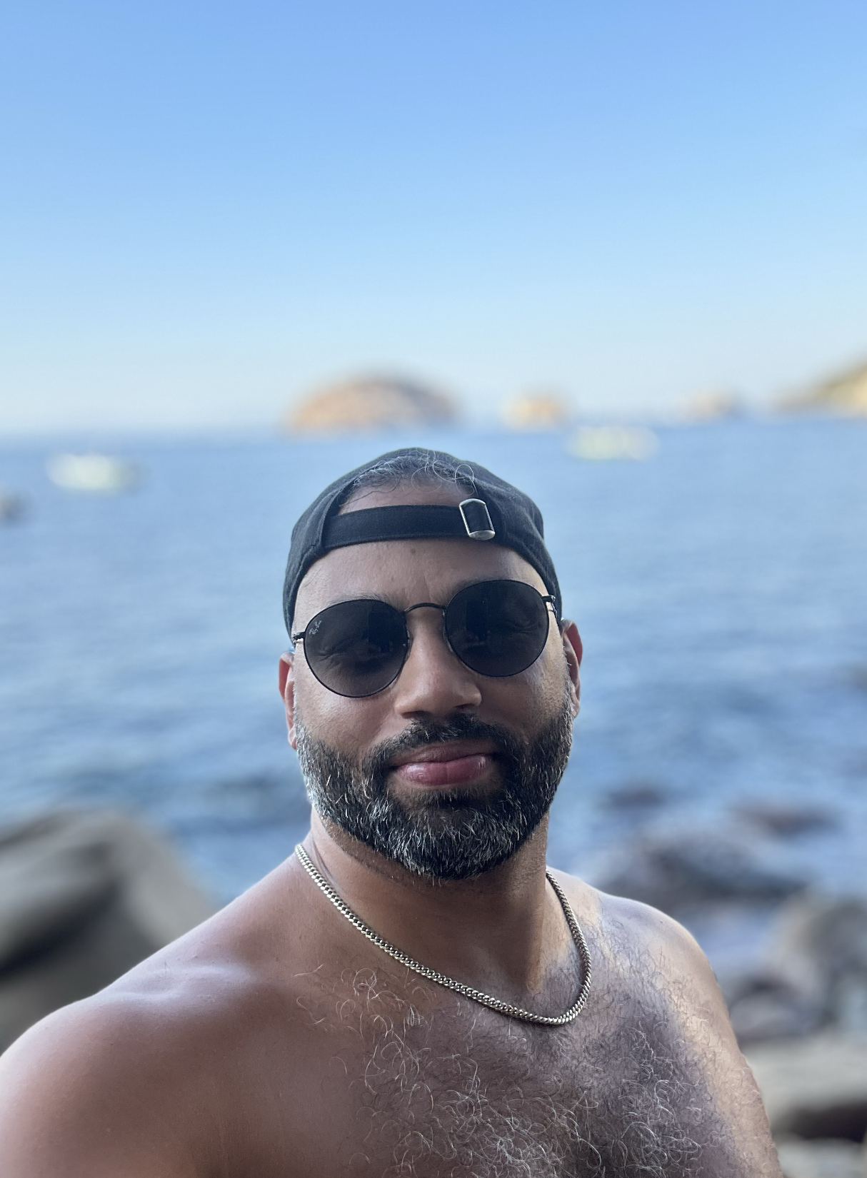 Black gay man in puerto vallarta mexico wearing raybans