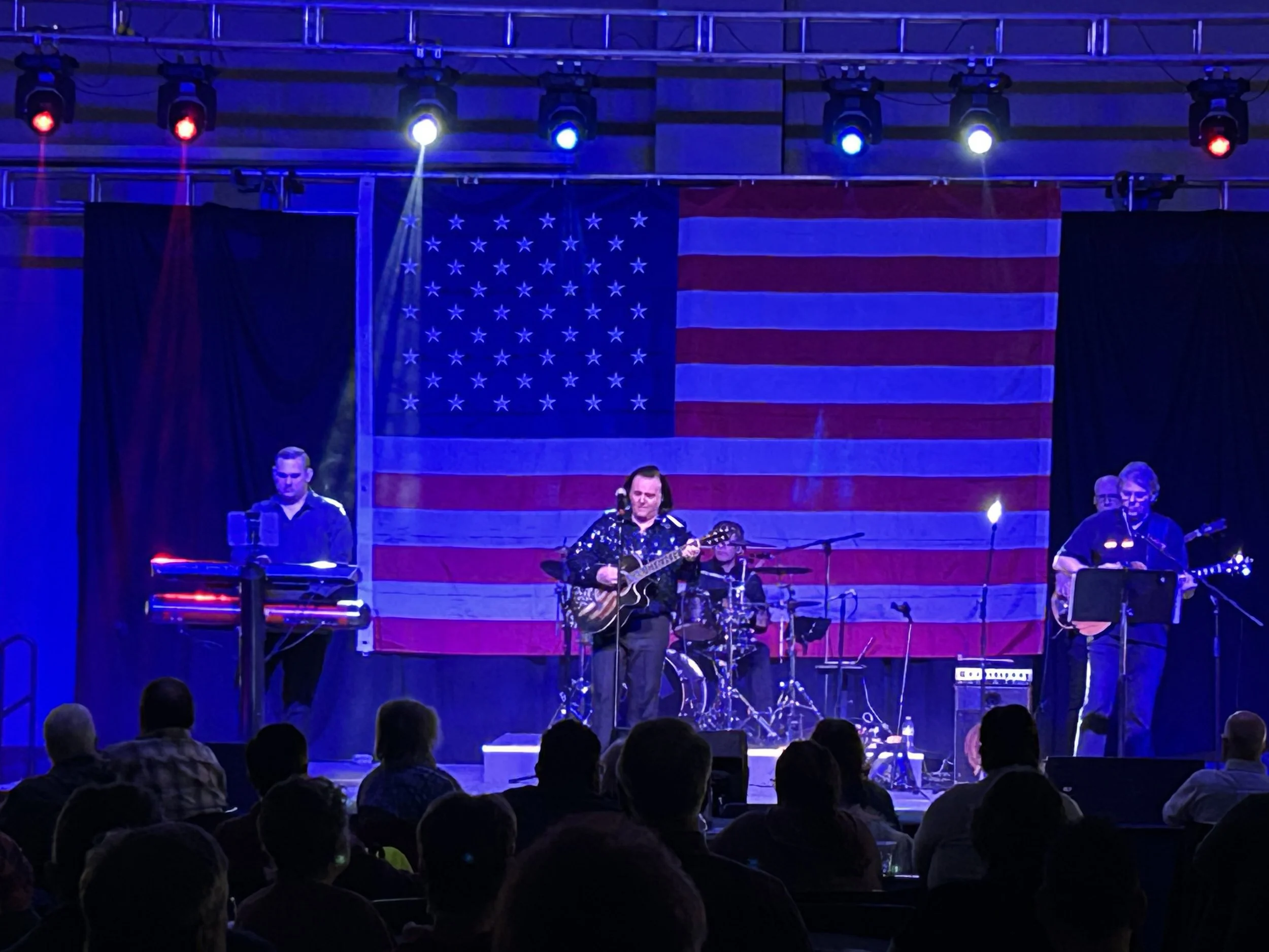 Solitary Man performs live at the APlex in Alpena, Michigan, entertaining the audience with a high-energy Neil Diamond tribute concert.