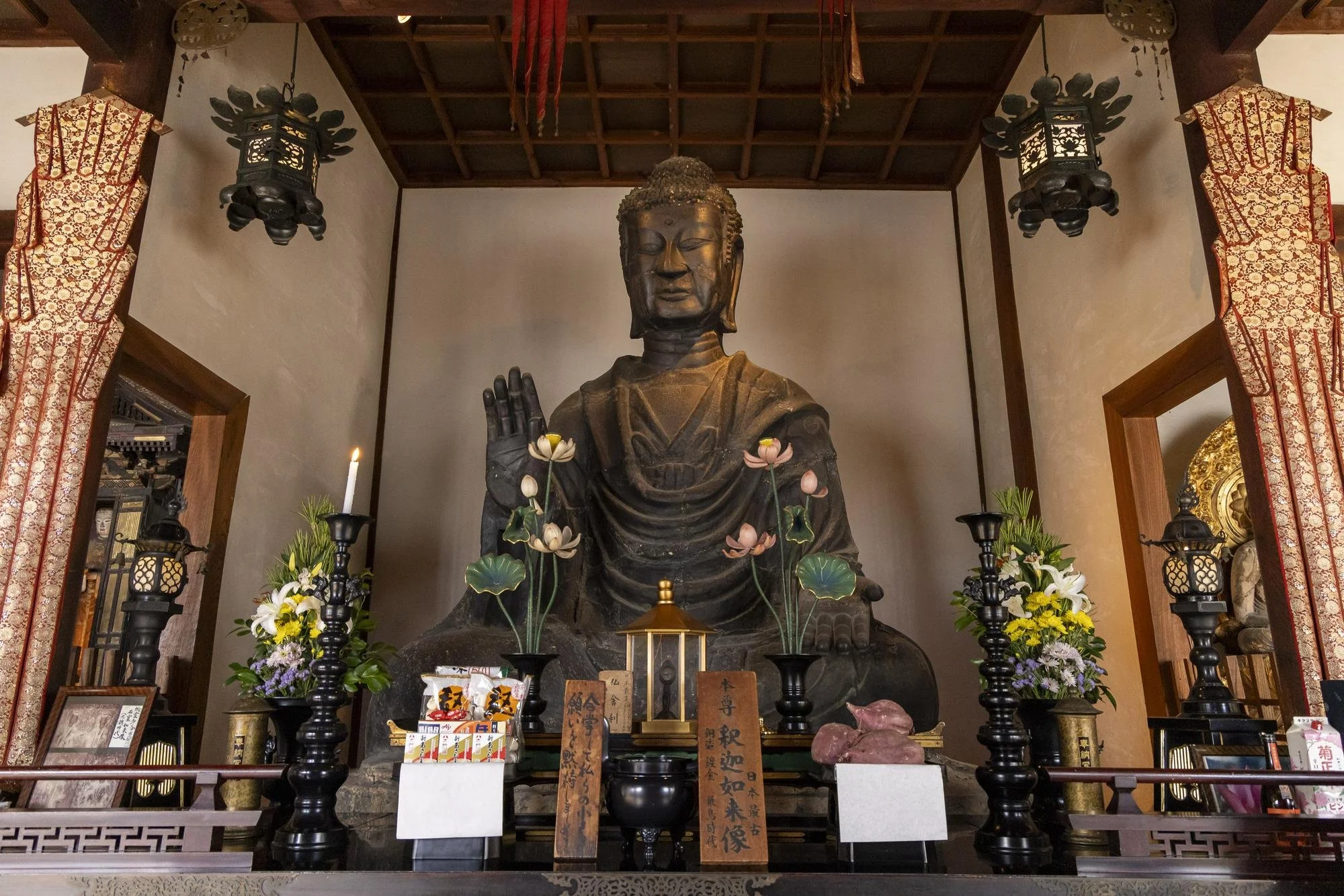 The seated Great Buddha of Asuka-dera displayed inside the temple’s main hall in Asuka, Nara.