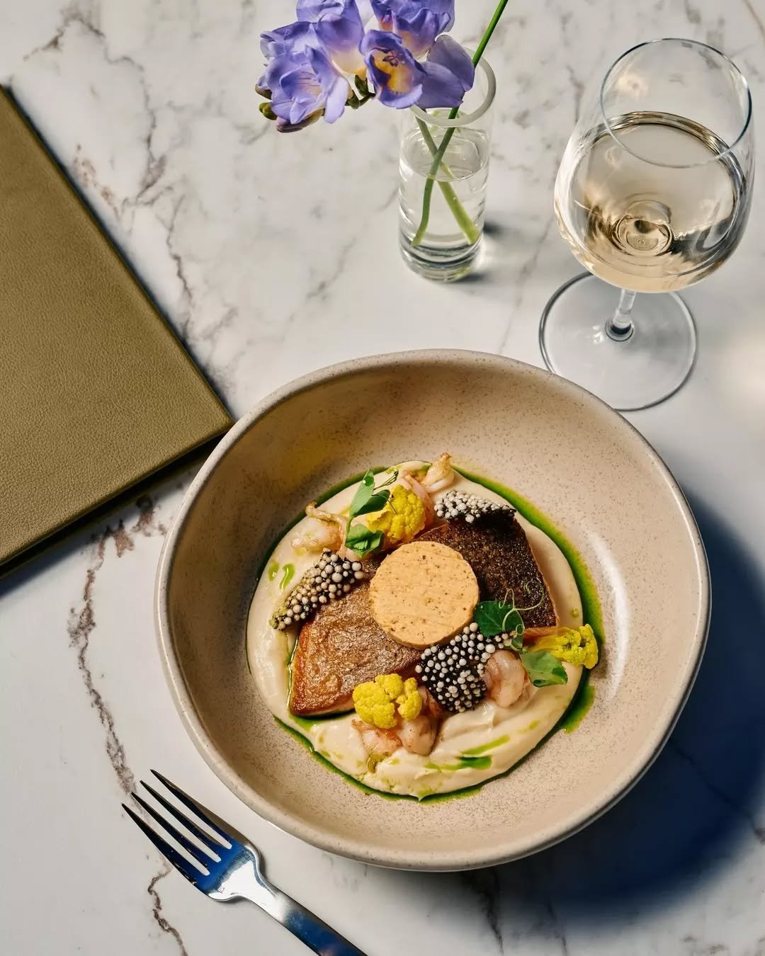 This is how we do fresh market fish. We&rsquo;re talking pan seared fish, delicious Skull Island prawns, and spicy XO butter that ties it all together. 

Dinner date? 
Tag them below, if they don&rsquo;t reply in 1 hour, they&rsquo;re buying the firs