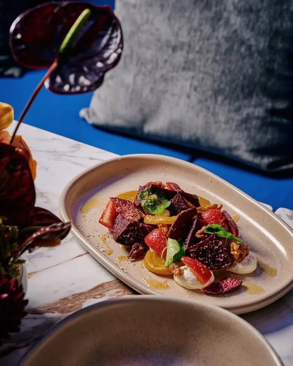 Vibrant beets, creamy chevre, and the snap of honey-glazed walnuts.

A riot of colour and balance, finished with fresh strawberries. Our marinated beetroot $18.