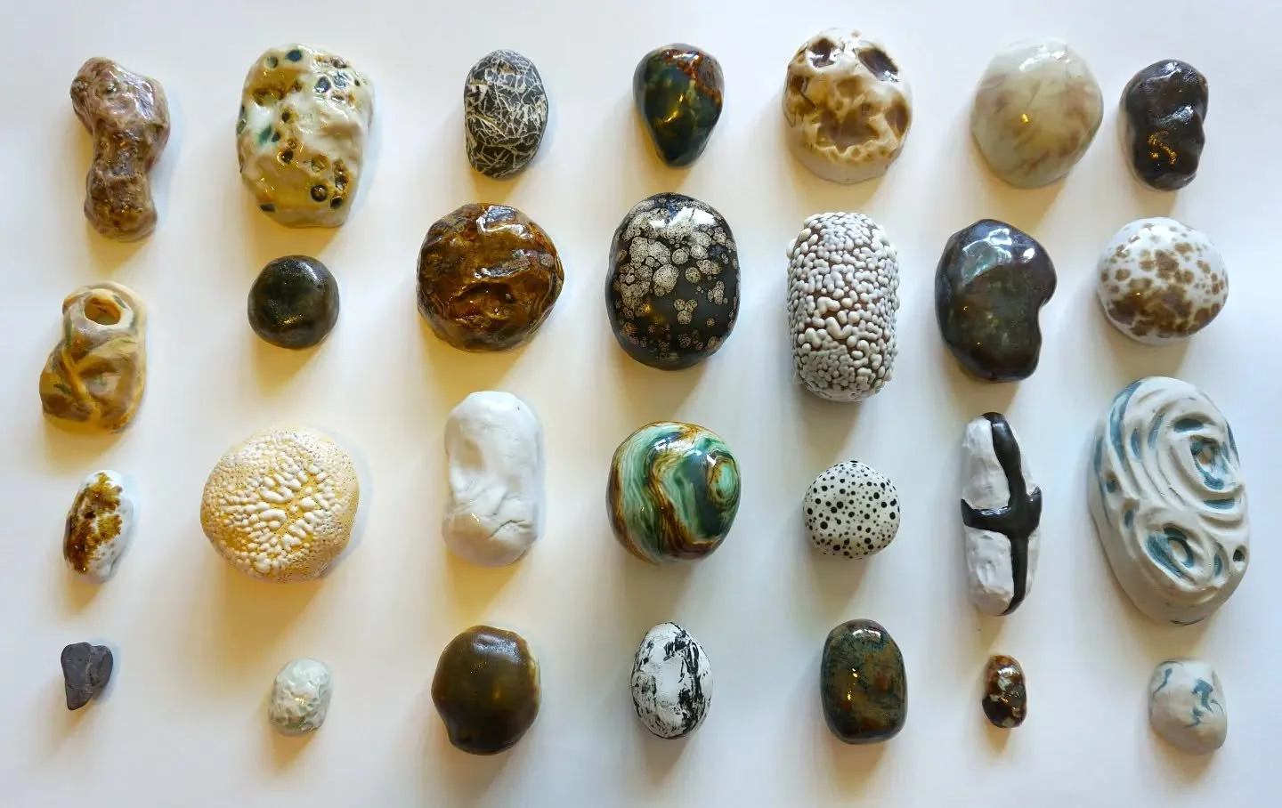 'Turned'
A collection of small ceramic stones replicated experiences, places and natural objects through glaze experimentation