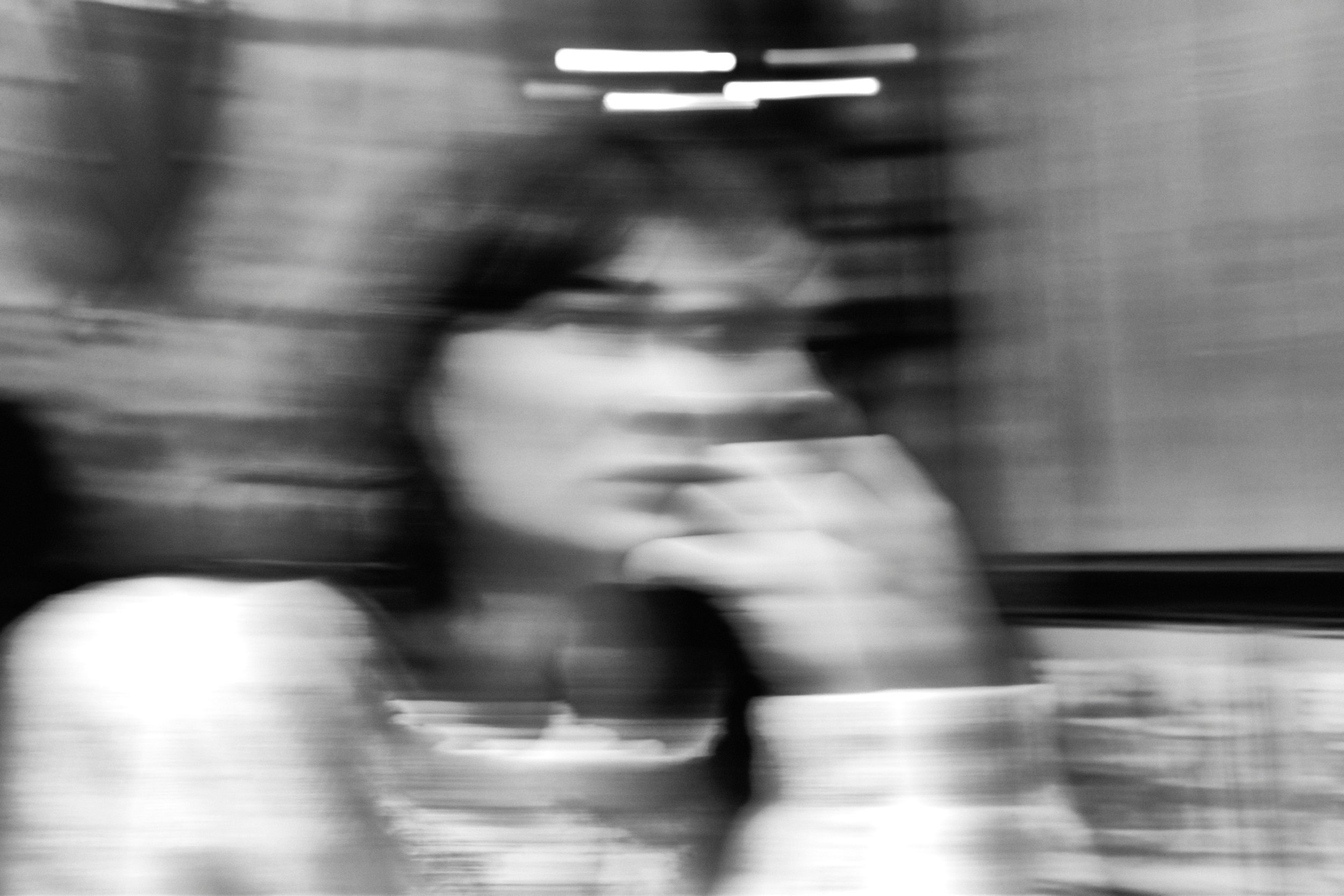 Woman looking away, symbolising the complexity of consent in relationships and emotional nuance.