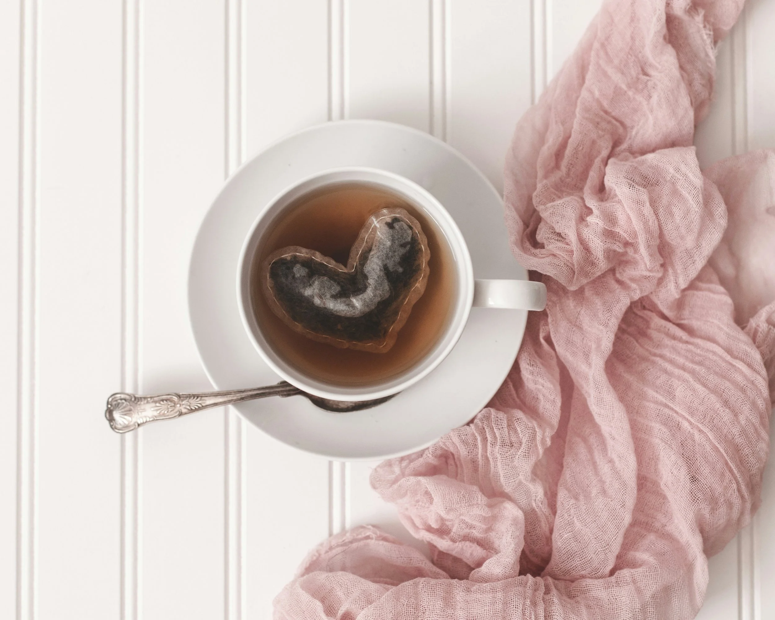 Cup of tea and blanket symbolising calm reflection and purpose in Japanese life philosophy