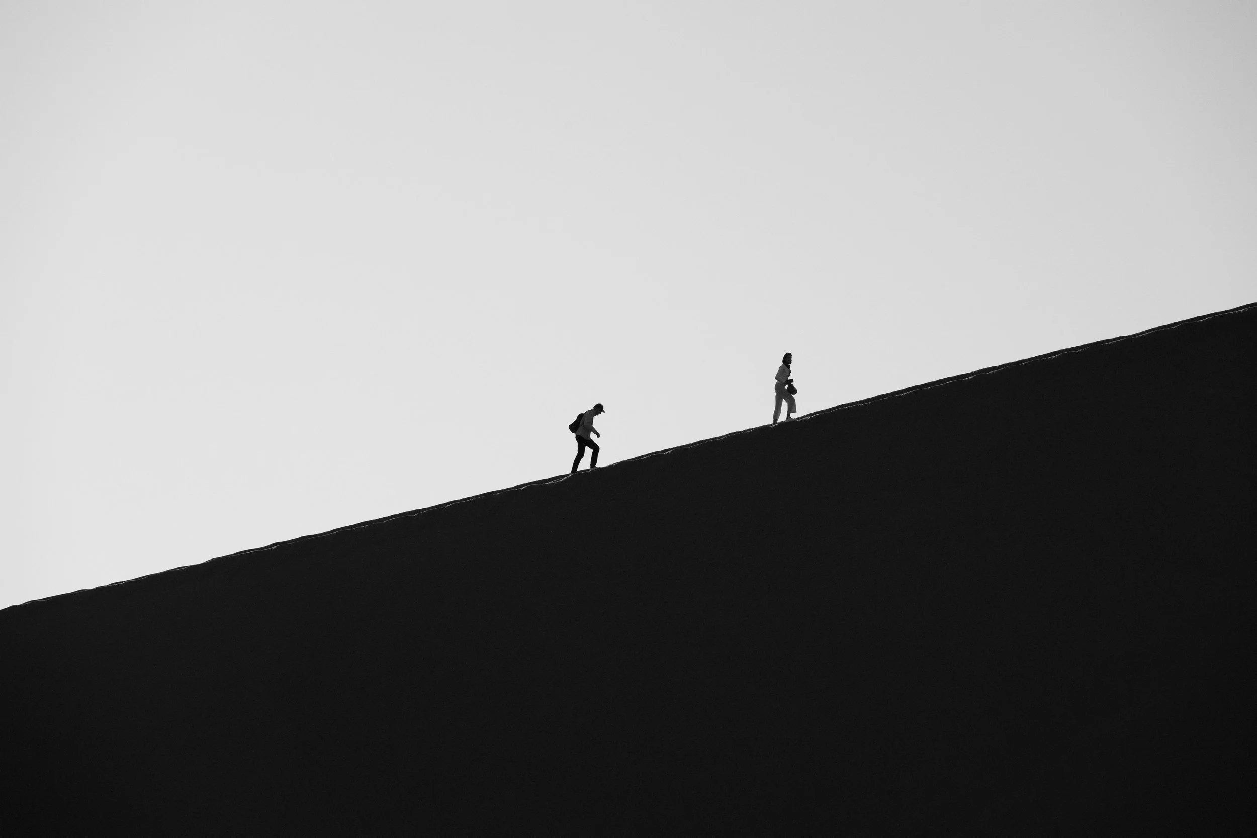 Why we need relationships for emotional support, shown by two people walking together through uncertainty