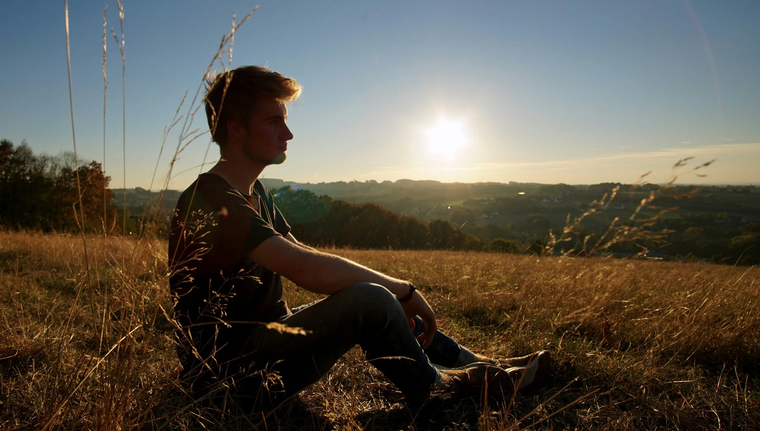 Friends sitting together outdoors, reflecting connection, perspective, and key takeaways for singles on Valentine’s Day