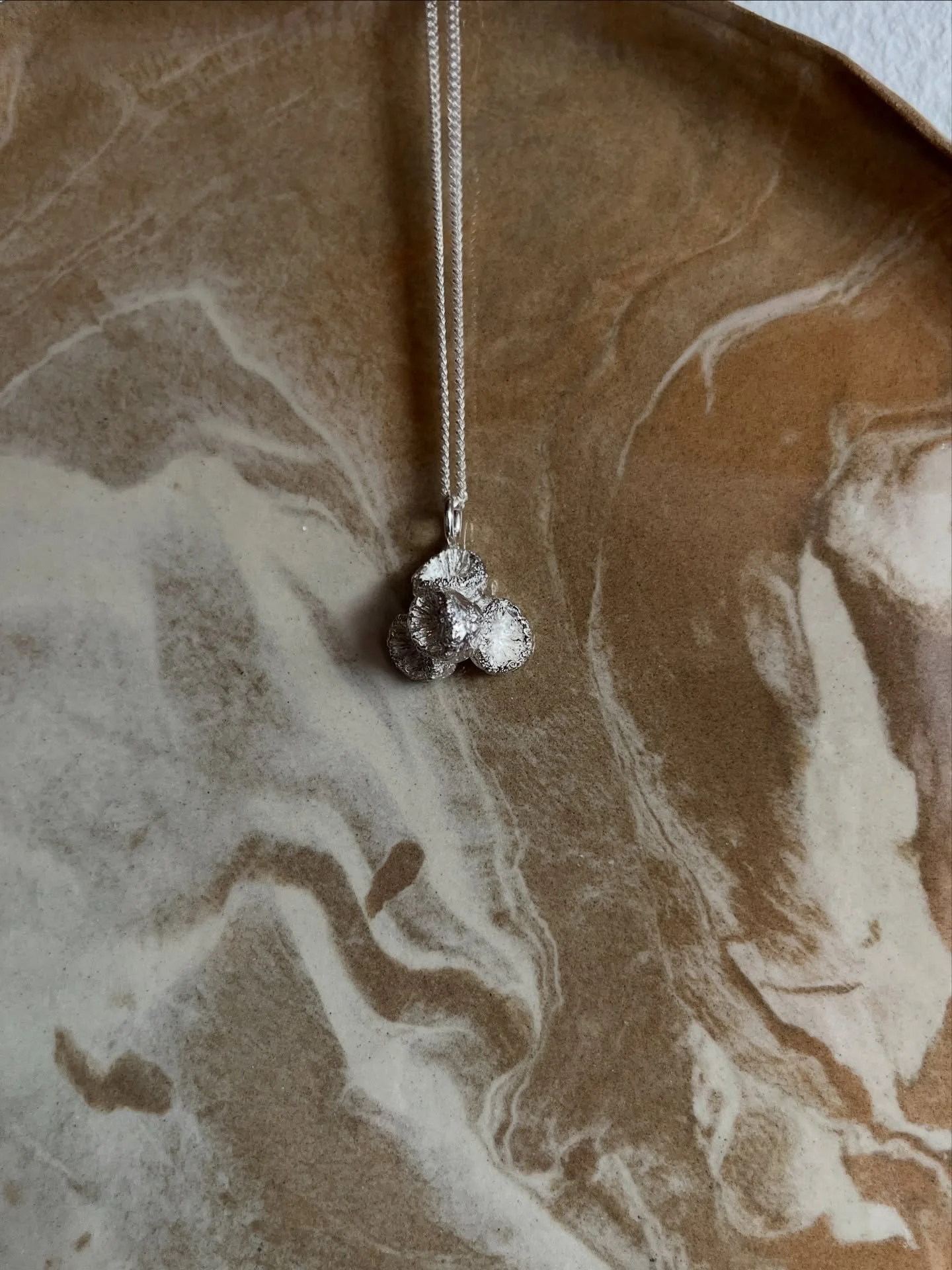 Cora necklace and rings 🪸
Made with fragments of a coral structure, crafted in sterling silver in our Copenhagen studio. Soon available online.