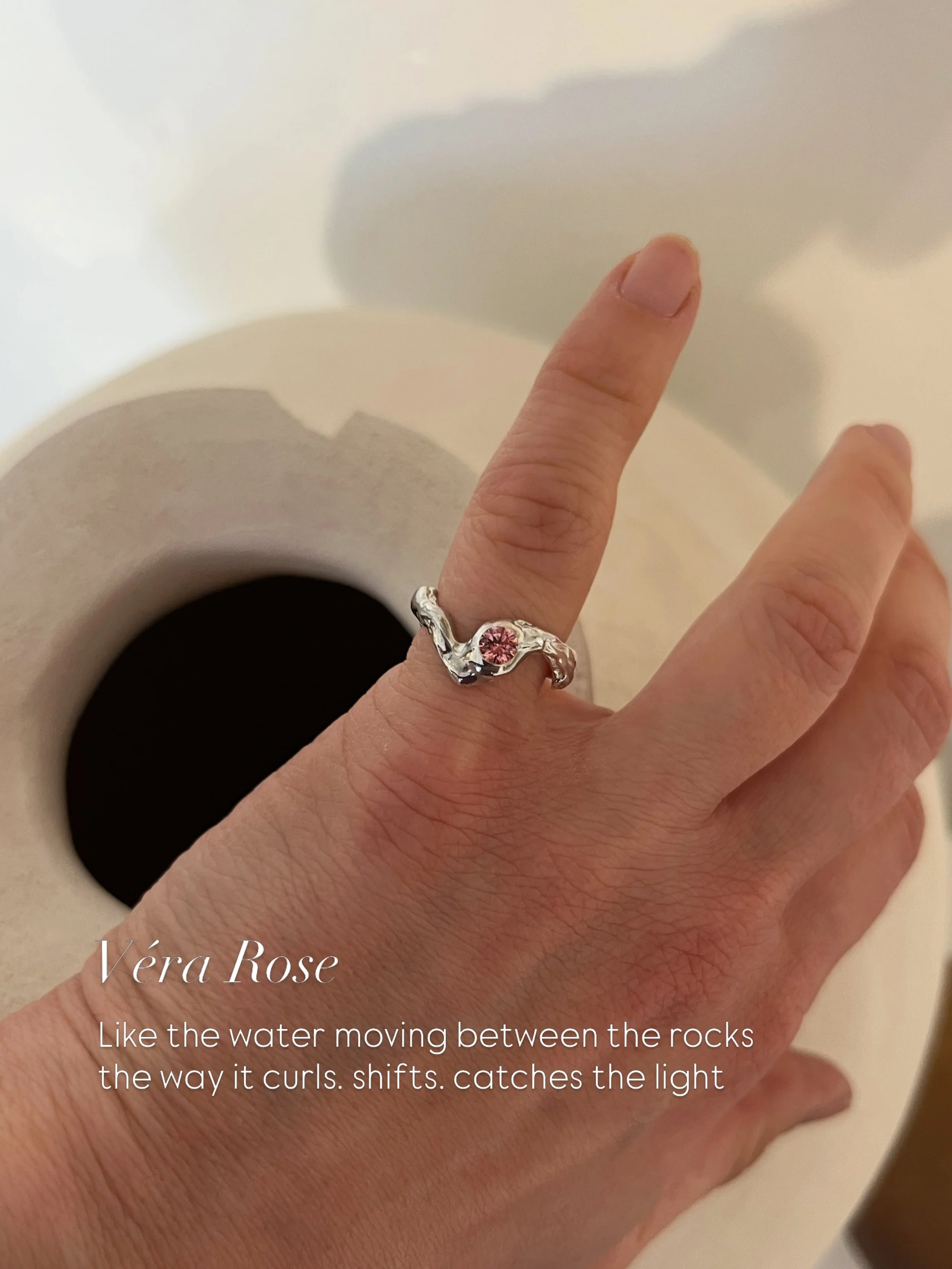 V&eacute;ra Rose| one of a kind 
it started with the water. the way it moves between the stones &mdash; curling, catching light, never stopping. 
I wanted to hold that movement in silver. 
a small whirlpool, a pink stone at its centre. V&egrave;ra Ro