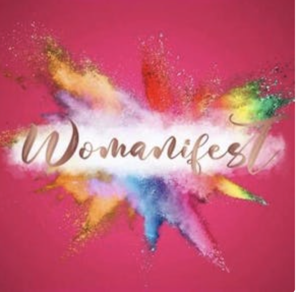 Pink background with multicolored powder explosion and the word 'Womansifest' written in cursive