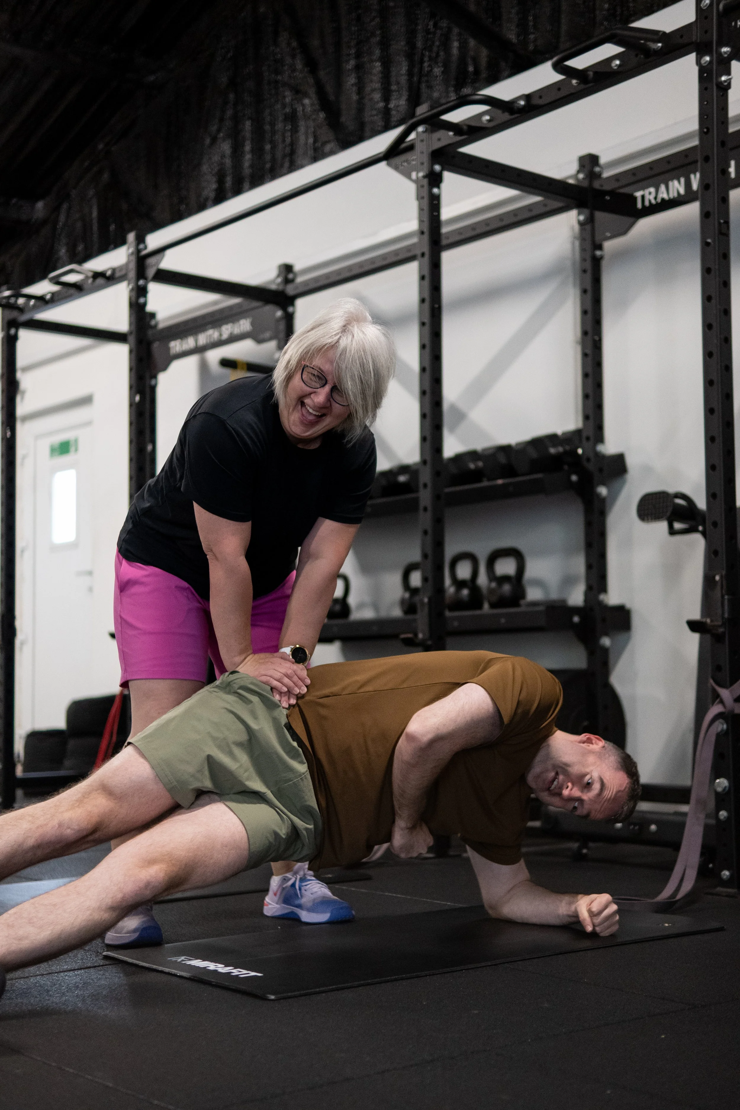 A SPARK member training with a coach