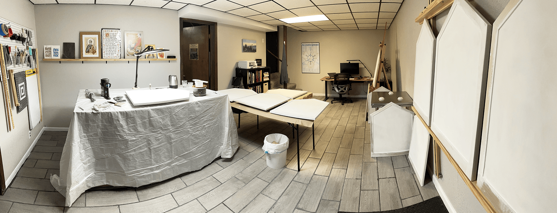 View of the studio with the boards drying during the gesso application