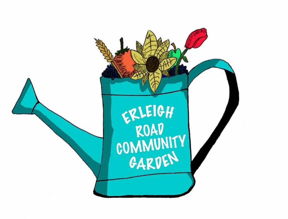 turquoise watering can with flowers in it