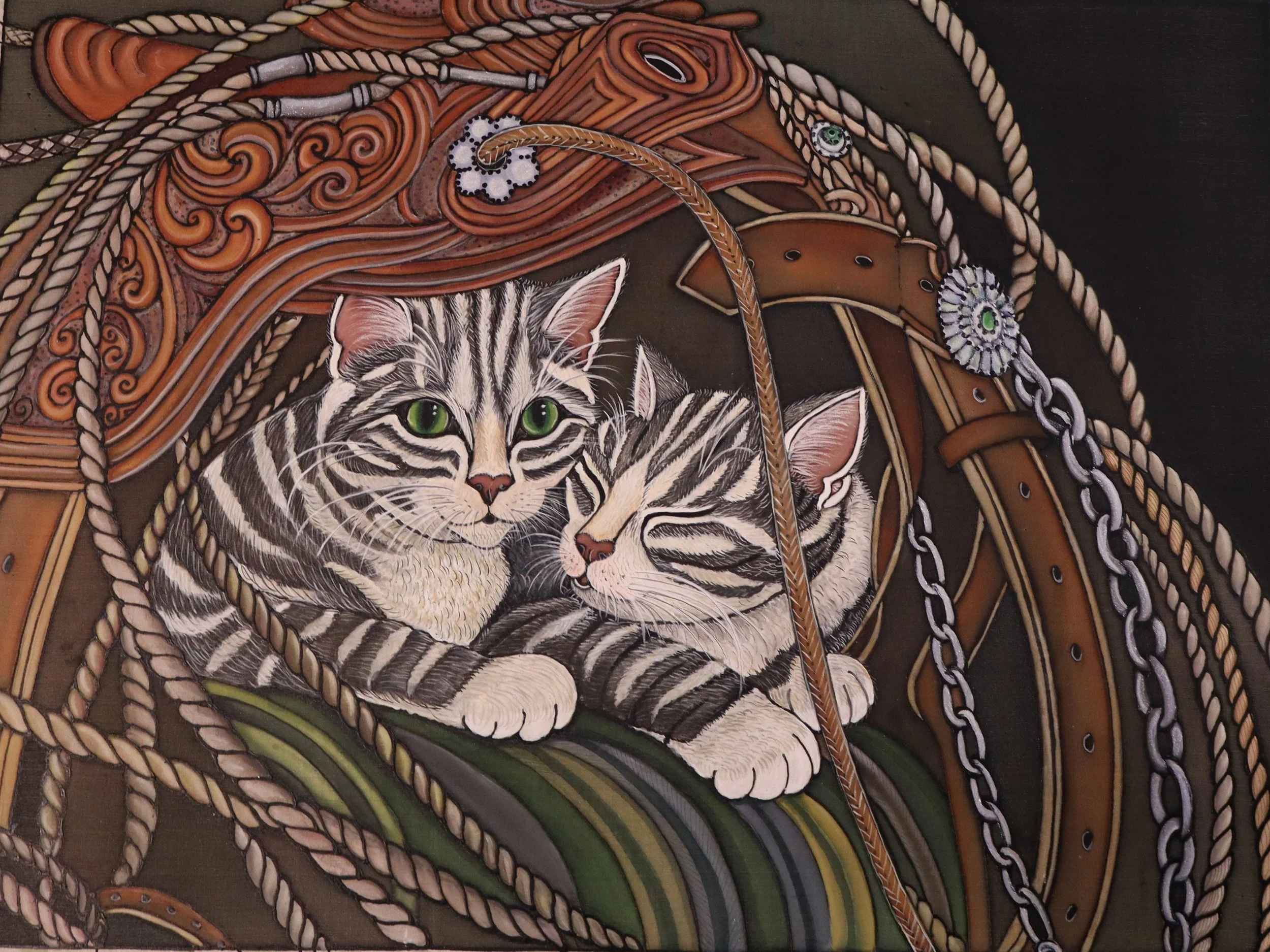 cat in saddle 2.JPG