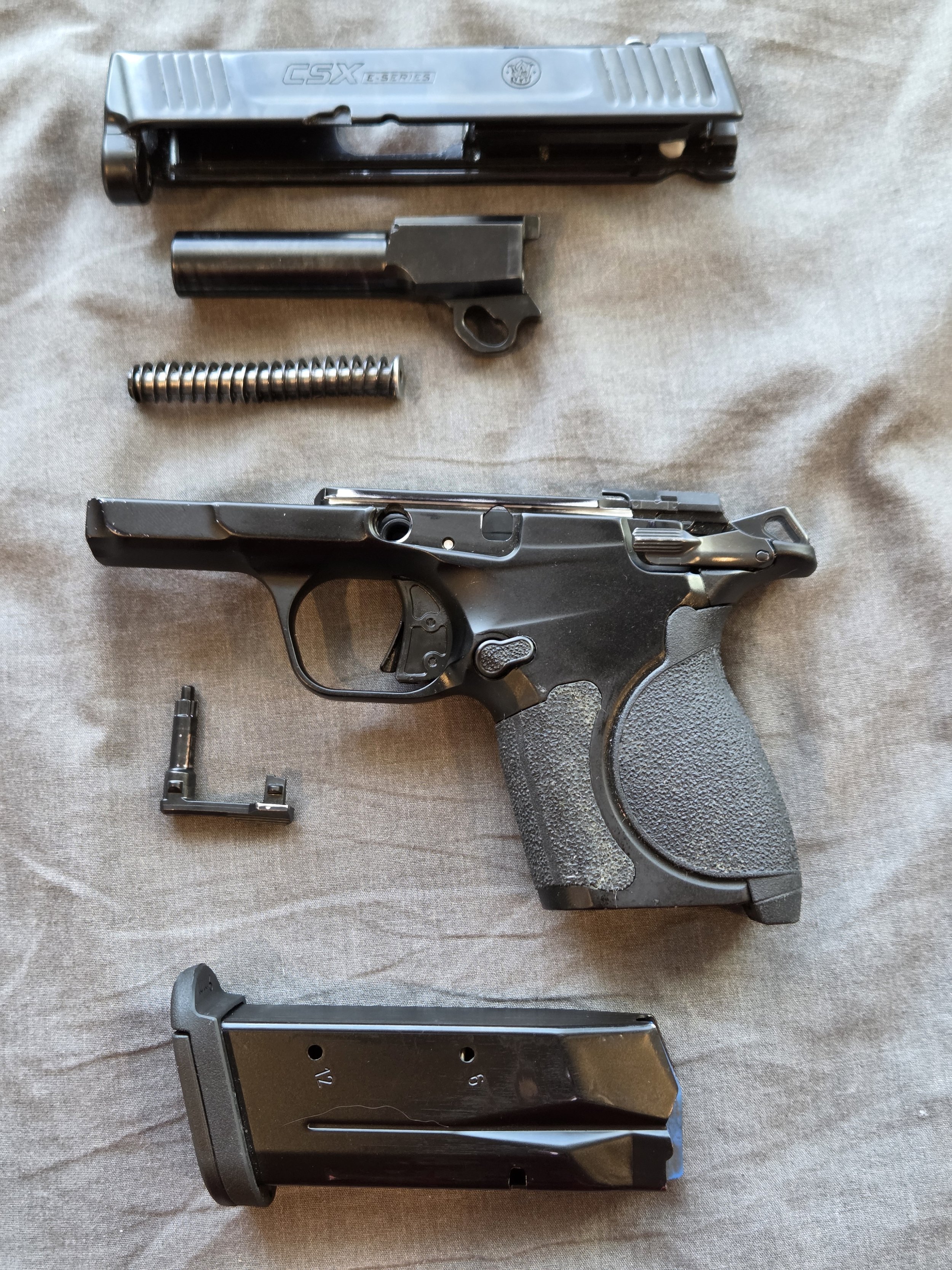 S&W CSX disassembled, showing field stripped components